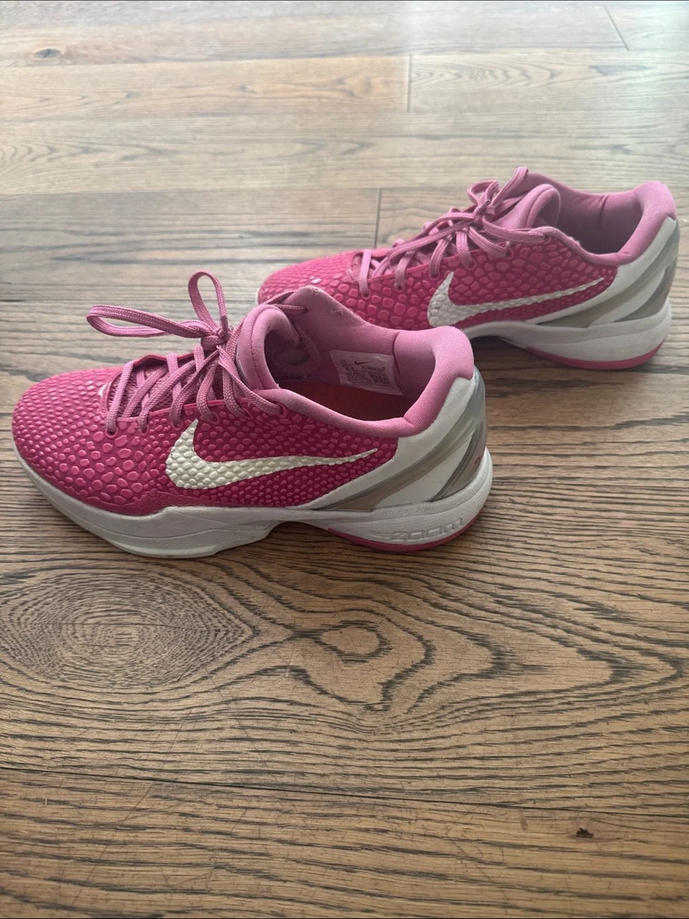 Nike Pink Low-Top Basketball Sneakers with White Swoosh